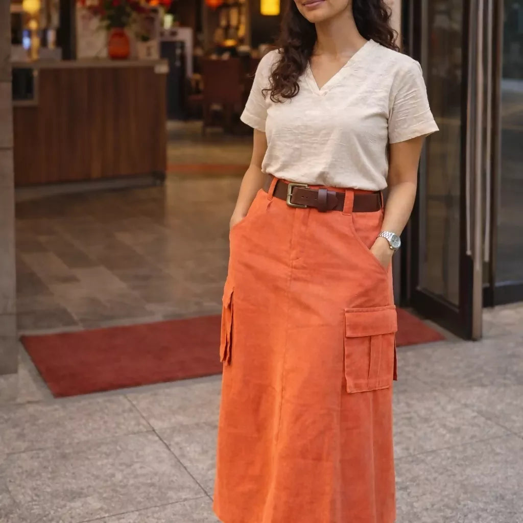 ORANGE GRUNGE - High Waist Bright Saffron Solid Tone Cargo Skirt in knee length .