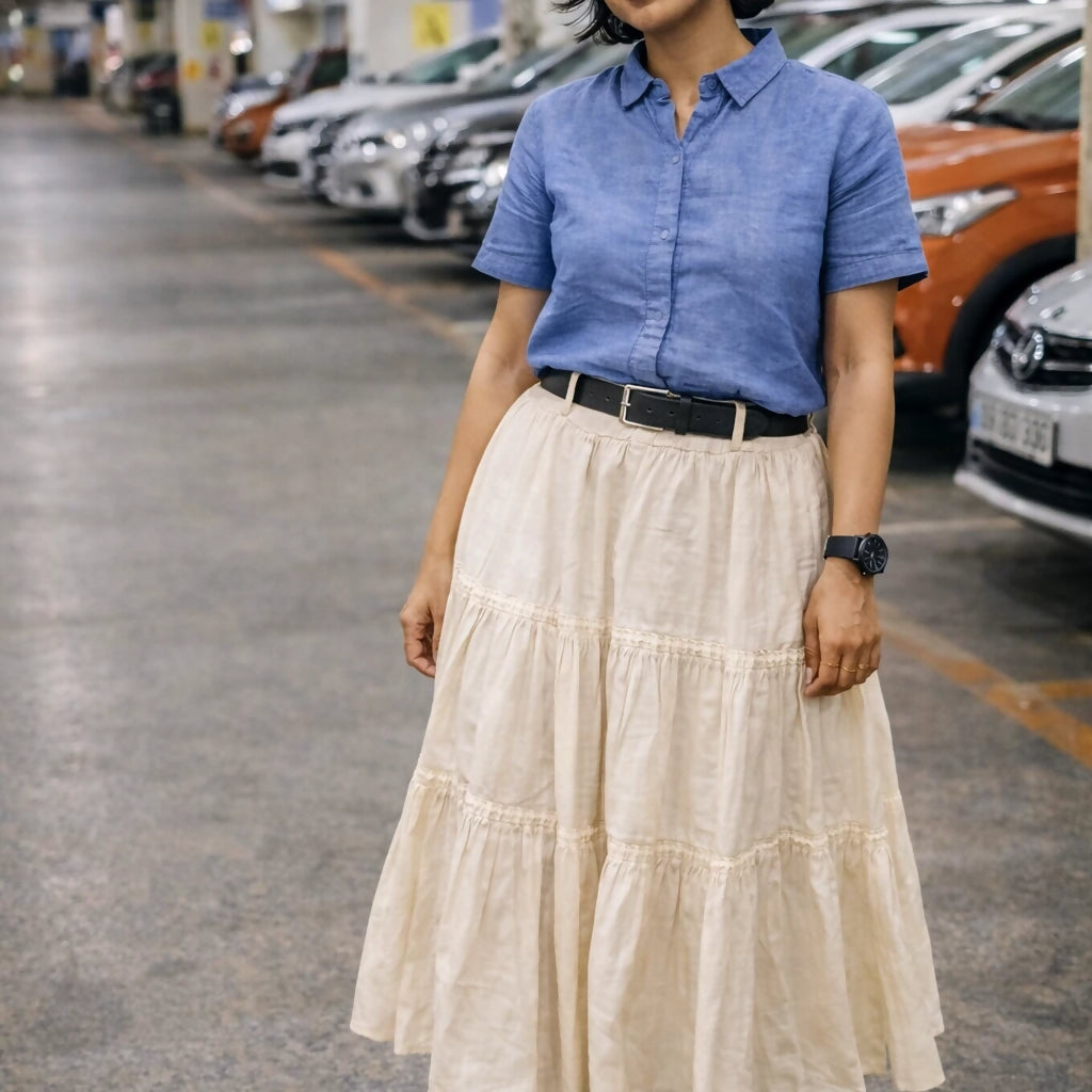 FEMME - Cream Solid Maxi Skirt with slip-on closure, featuring a flared hem.
